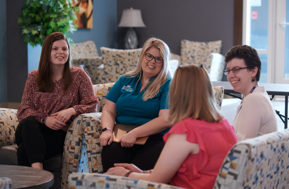 A group of women talking.